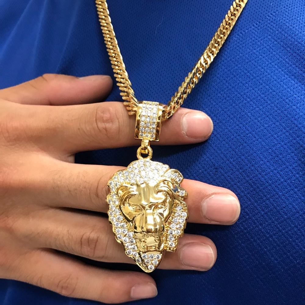 Cuban link chain with iced out lion’s head pendant